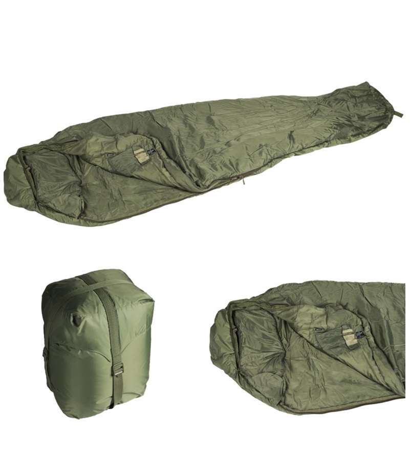  Zagotovite si udoben in varen spanec na prostem z vojaško spalno vrečo Tactical 4 v olivni barvi. Odlična toplotna izolacija, vrhunska kakovost, vsestranskost in odpornost na vremenske razmere. Izberite vrhunsko opremo za avanture na terenu!