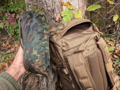 Na krovnem delu nahrbtnika Karrimor SF Predator 30 se nahaja prostoren žep z zapiranjem na YKK zadrgo, ki zlahka sprejme zloženo šotorko krilo britanska basha